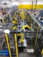 AST SuperTrak and Fanuc robot based assembly cell, upper end line view.jpg
