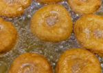 Doughnuts are fried in oil