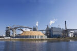 Riverfront,Florida,Paper,Mill,With,Large,Wood,Chip,Storage,Pile