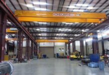 Fast Fab erects CAID Industries’ Mid-West structure of the year complete with Schweiss Doors crane doors Schweiss Doors