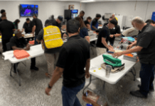 Detroit Manufacturing Systems Donated Backpacks to Detroit Area Children DMS