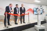 ABB’s Marc Segura, John Bubnikovich and Sami Atiya cut the Ribbon on ABB Robotics renovated facility