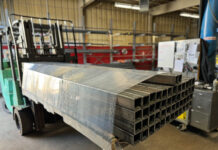 Orbital Stretch Wrapper Secures Long, Awkward Products that Extend Beyond Pallet Edges TAB