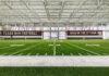 Whether inside or outside, Texas A&M aims for football excellence with a lift from Schweiss Doors Schweiss