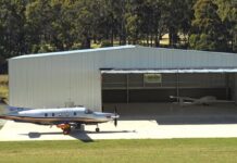 Welcome to the Vale: Schweiss hydraulic hangar door in Tasmania opens a unique farm Schweiss